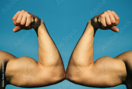 Muscular hand vs strong hand. Competition, strength comparison. Vs. Fight hard. Health concept. Hand, man arm, fist.