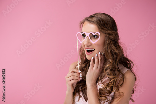 In love woman seeing through rose coloured glasses