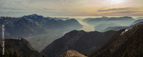 OLYMPUS DIGreat landscape at Iseo lake in winter season, foggy an humidity in the air. Panorama from Monte Pora, Alps, ItalyGITAL CAMERA