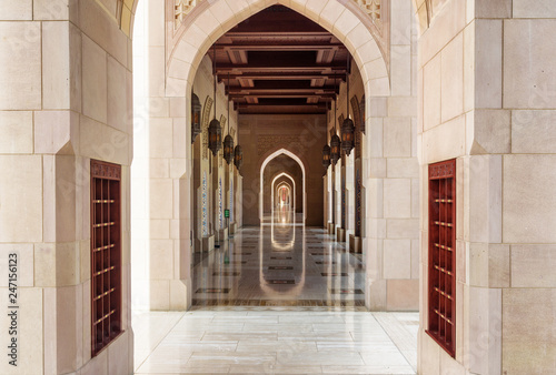 Deserted arched passageway at the Sultan Qaboos Grand Mosque