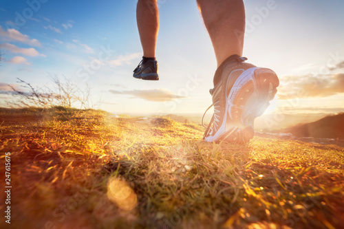 Cross-country running in early morning sunrise