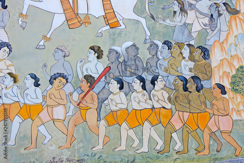 Colorful indian mural in the fort at Jodhpur showing a royal procession, including elephant and courtiers from the Rajput era