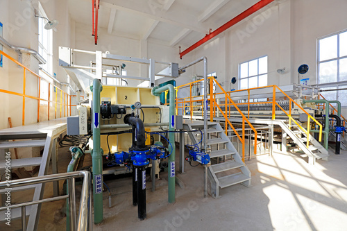 Plate frame filter press in sewage treatment plant, China.