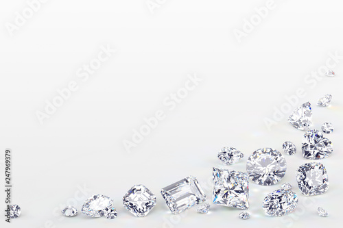 Variously cut diamonds scattered along the image corner on white background