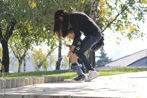 Children pissing on the path of the green nature park