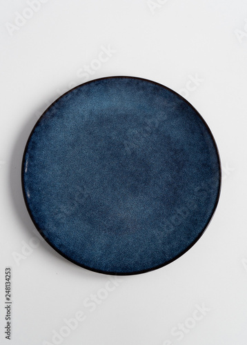 New blue plate on isolated white background.