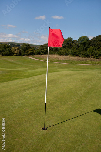 Red Flag on a Golf Course marking the hole