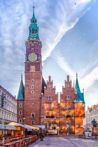 Town Hall on the Market square in Wroclaw, Poland early in the morning. Vertical cityscape. Colorful cities concept.