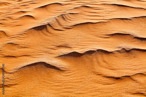 Desert orange sand dunes top view close up, yellow sand texture ornament, desert barchans background, dry hot climate concept, summer heat weather design, arid soil and sand surface illustration