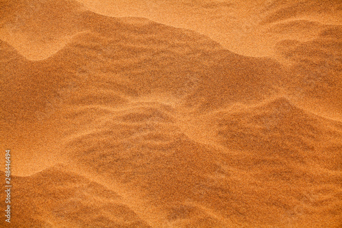 Desert orange sand dunes top view close up, yellow sand texture ornament, desert barchans background, dry hot climate concept, summer beach heat weather design, arid soil and sand surface illustration