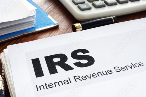 IRS Internal Revenue Service documents and folder.