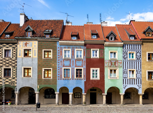 Colourful historical houses with ornaments and an arcade at the town square called Stary Rynek in Poznan