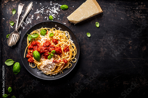 delicious appetizing classic spaghetti pasta with tomato sauce, parmesan