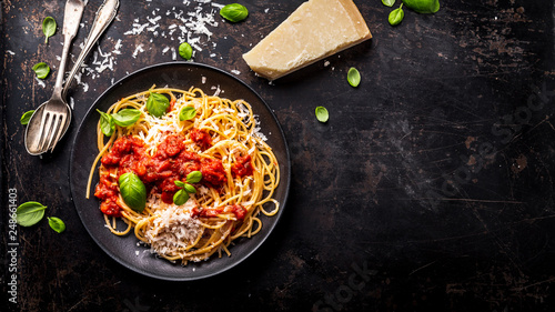 delicious appetizing classic spaghetti pasta with tomato sauce, parmesan