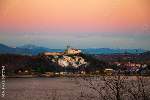 View of the Angera fortress at sunset