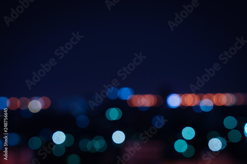 Blurred light night city bokeh abstract background