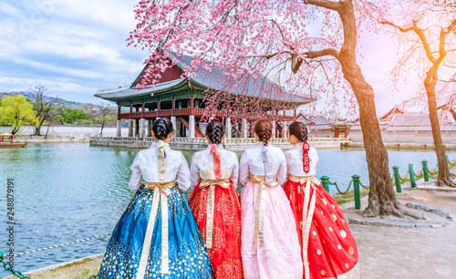 Cherry Blossom with Korean national dress at Gyeongbokgung Palace Seoul, South Korea