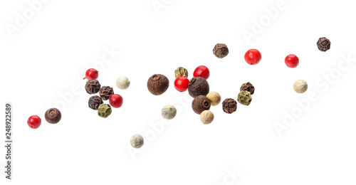 Pepper mix. Black, red, white and allspice peppercorn seeds isolated on white background
