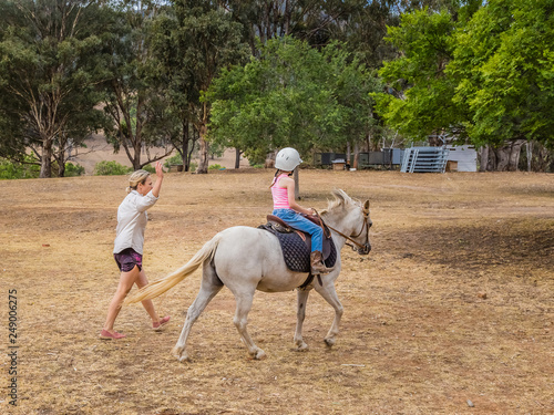 Young child learning to ride in the Upper Hunter Valley, NSW, Australia.