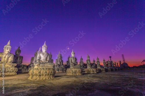 a lot of Buddha statues in twilight at Tungsong Nakornsrithammarat