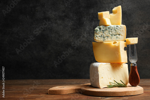 Cheese platter with rosemary and fork