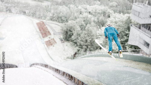 Ski jumper flying through the air during a practice session at the Lake Placid, NY, ski jumps