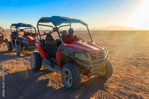 Safari trip through egyptian desert driving buggy cars