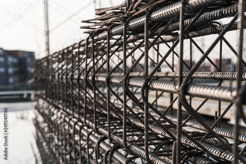 Reinforcement of concrete work. Using steel wire for securing steel bars with wire rod for reinforcement of concrete or cement. focus to steel wire