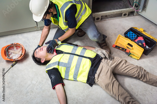 Tilt Head, Life-saving and rescue methods. Accident at work of electrician job or Maintenance worker in the control room of factory.