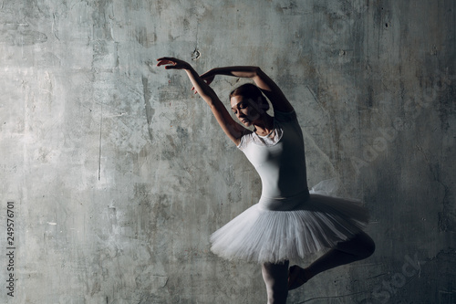 Modern ballet, great design for any purposes. Ballet dancer ballerina. Balance training. Classical choreography style. Beautiful dancer ballerina. Classical music. Elegant ballet style.