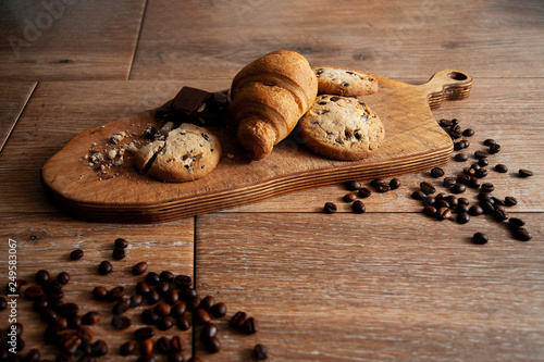 Cookies with chocolate and Croissant and coffee