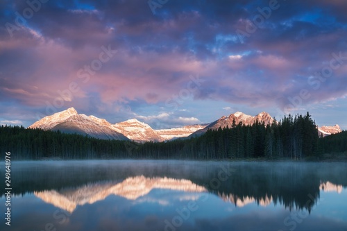 Lake Herbert panorama in a foggy morning with glaciers mountain and reflection in Banff National Park, Canada The Canadian Rockies or Canadian Rocky Mountains. Amazing landscape concept 