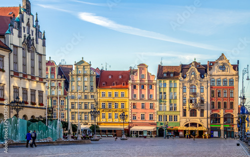 Wroclaw, Poland. Market square with it's famous fountain and colorful historical houses early in the morning.