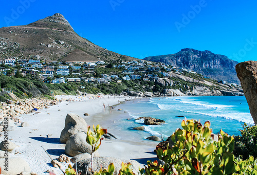 Scenic landscape of Llandudno Beach with white sand and turquoise water in Cape Town, South Africa