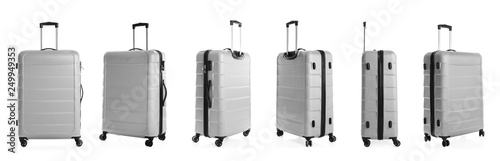 Set of stylish light suitcase for travelling on white background