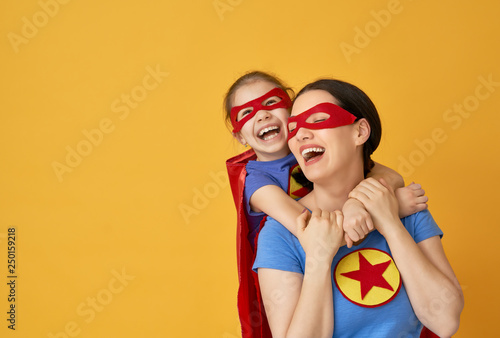 Family in Superhero costumes