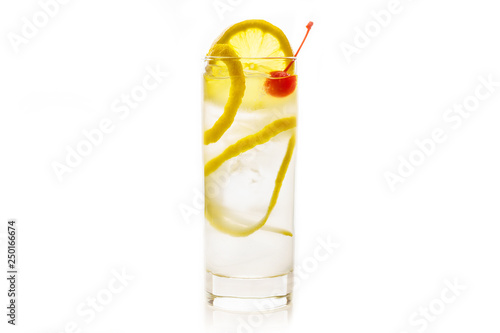 Traditional Tom collins cocktail isolated on white background. Selective focus. Shallow depth of field.