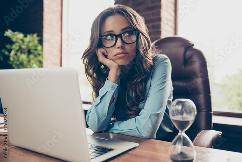 Close up photo beautiful she her business lady hands arms hold head chin not satisfied face look up check wall clock running of time all late meeting sit office chair wearing formal wear suit shirt