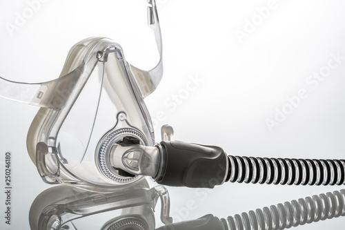 Sleep apnea CPAP mask on the white background