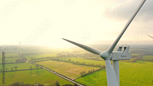 Aerial photo of wind turbines at sunset in Sainte Pazanne, France