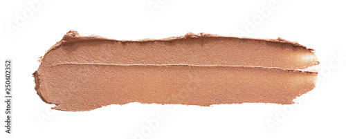 Light beige makeup smear of creamy foundation