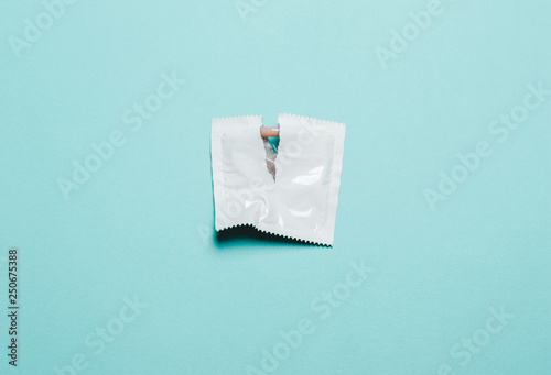 Condom on a blue background