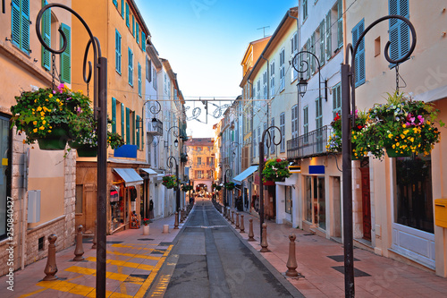 Colorful street in Antibes walkway and shops view