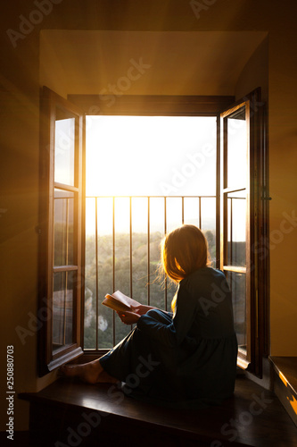 girl is reading a book