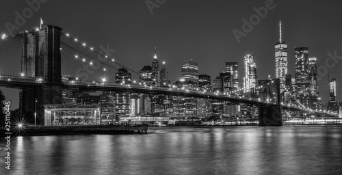 brooklyn bridge at night in black and white