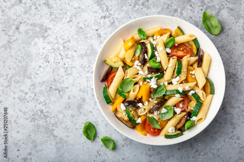 pasta salad with grilled vegetables ( zucchini, eggplant, bell pepper ant tomato) and feta cheese