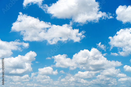 Blue sky and white clouds background.