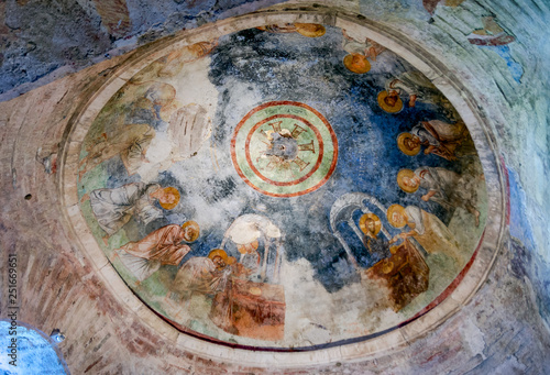 Bottom view of the dome of the church of St. Nicholas with colorful ancient frescoes of the biblical scene. Demre town, Turkey