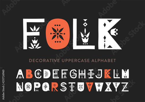 Vector display uppercase alphabet decorated with geometric folk patterns