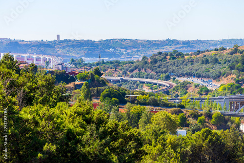Panoramic view on Lisbon. Travel Portugal. Roads and bridges in big european city